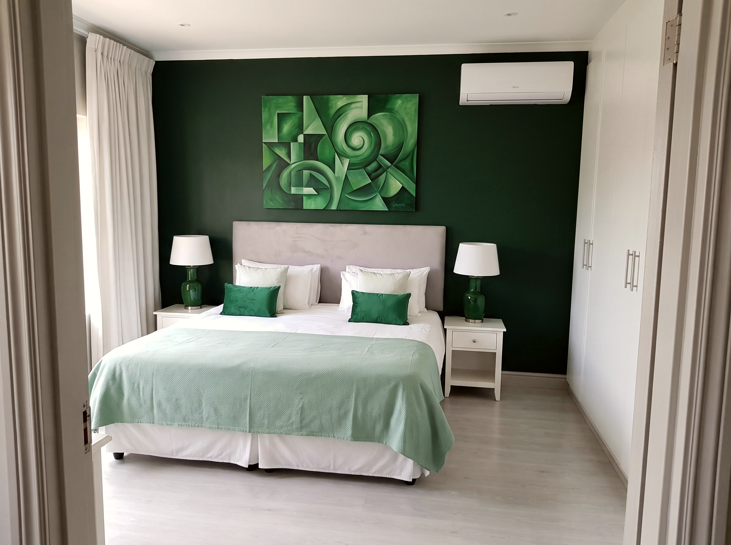 The Emerald Penthouse master bedroom